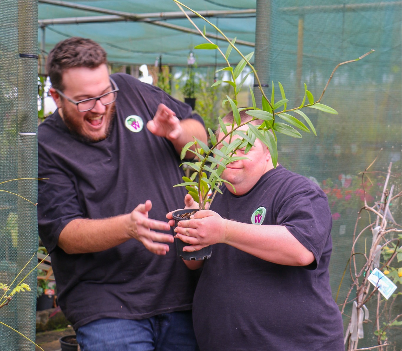 Two Windara employees laughing in the nursery