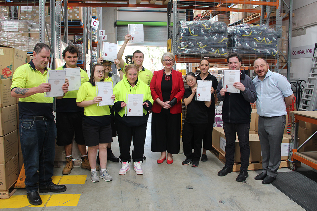 AchievAble graduates posing for a picture with CEO Jo-Anne Hewitt and COO Daniel Kyriacou with their certificates
