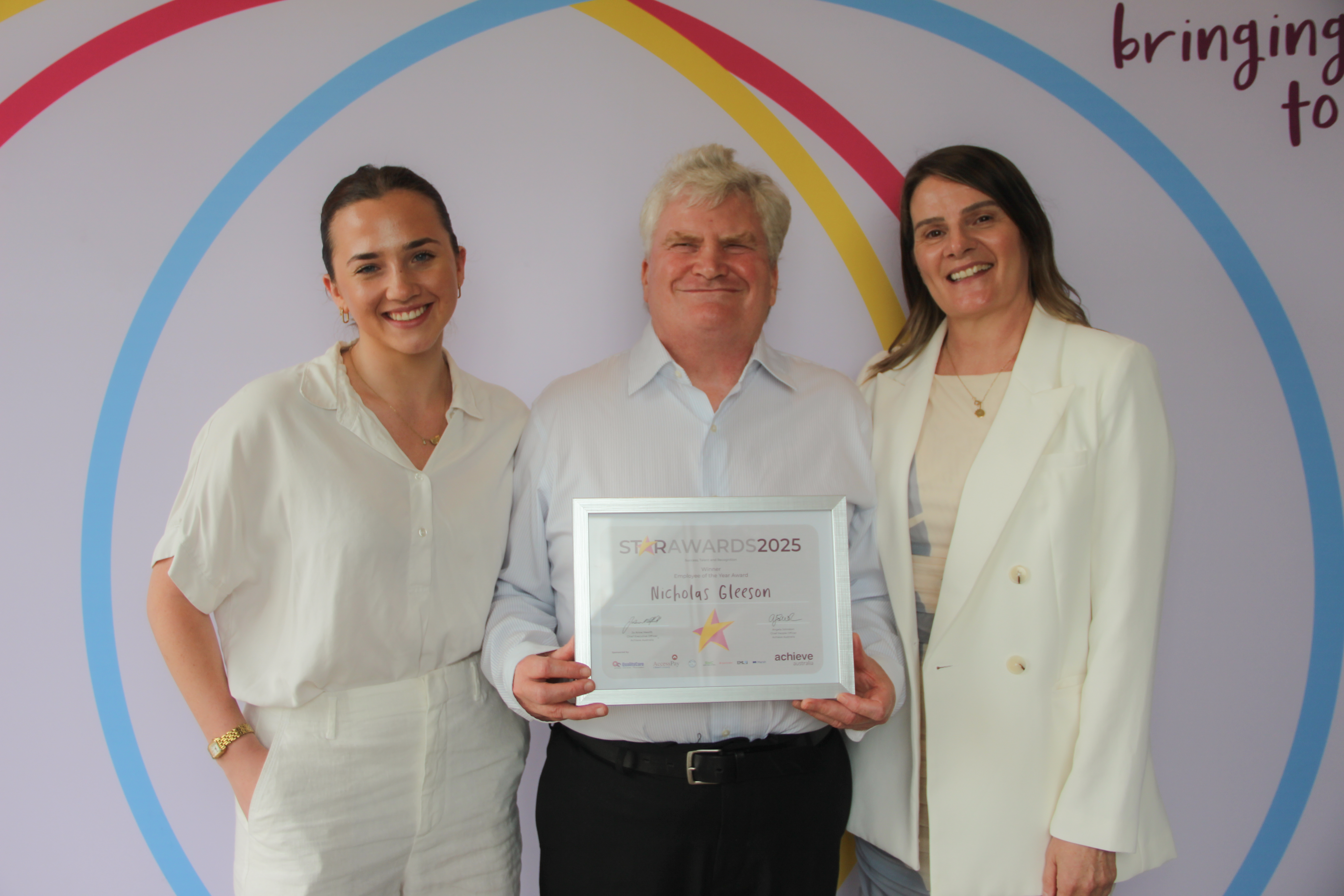 Nick receiving his Employee of the Year Award at the Star Awards