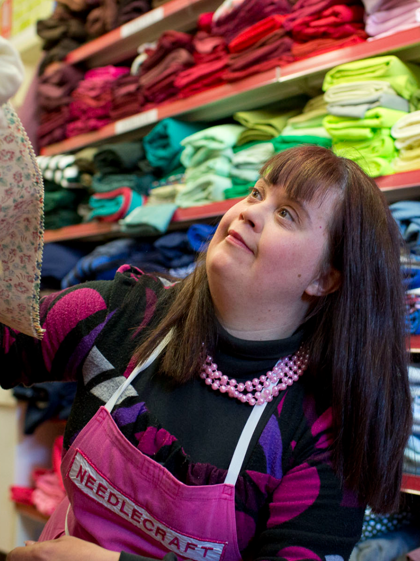 Person looking at fabric