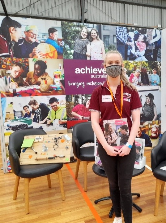 Achieve staff member at expo